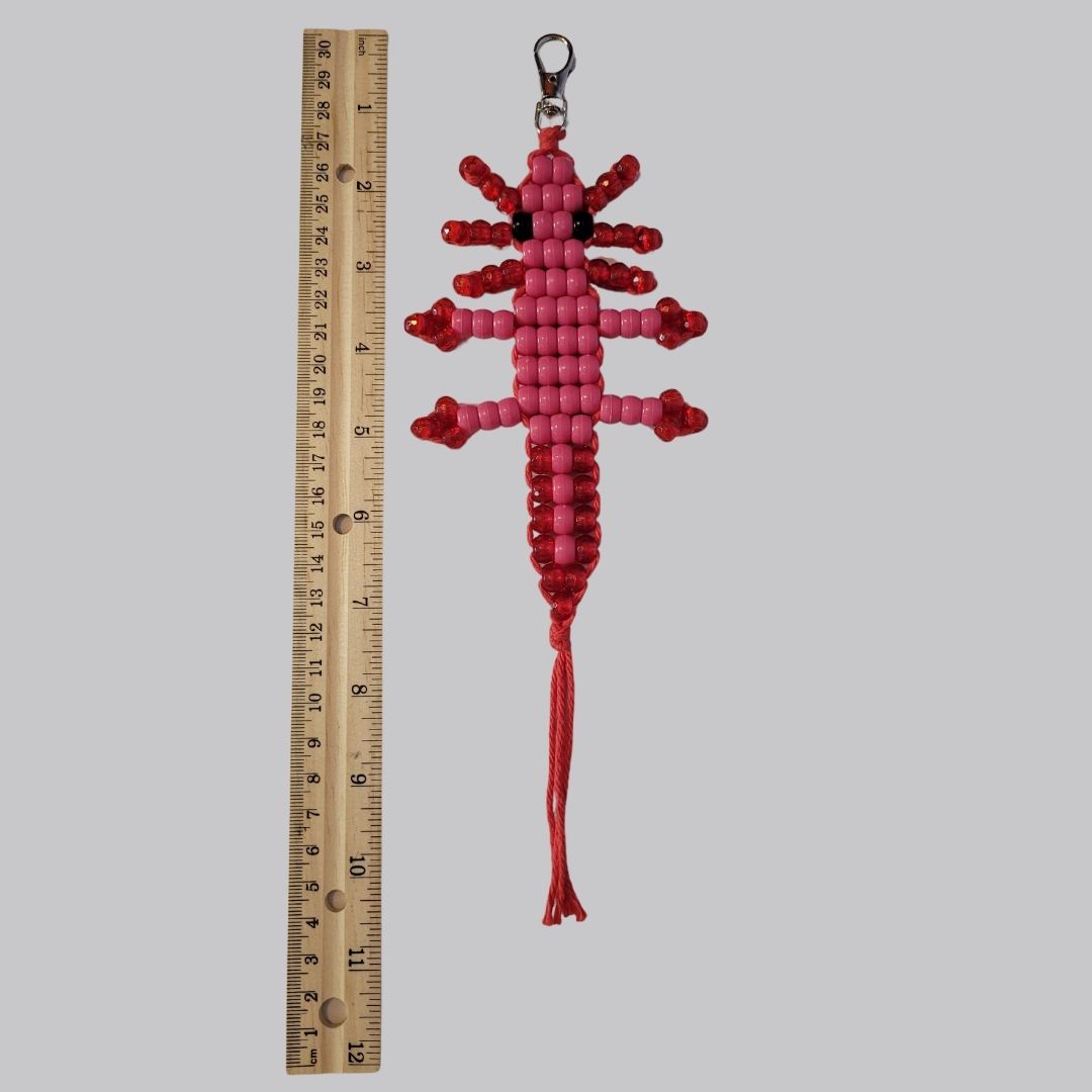 Dark pink Axolotl with Red Yarn